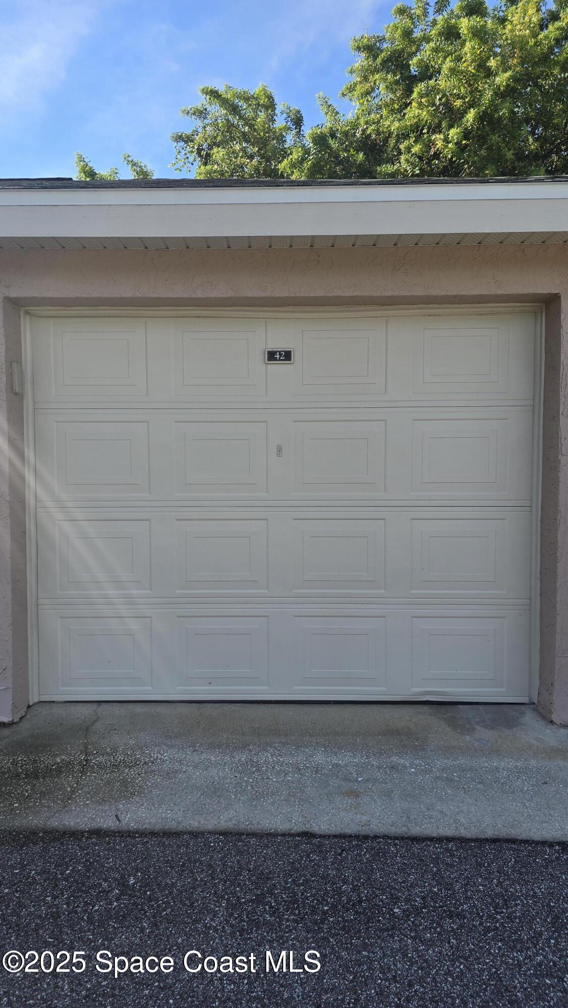 7667 North Wickham Road, Unit 1116 Melbourne, FL 32940 - Photo 3 of 34 a view of a yard