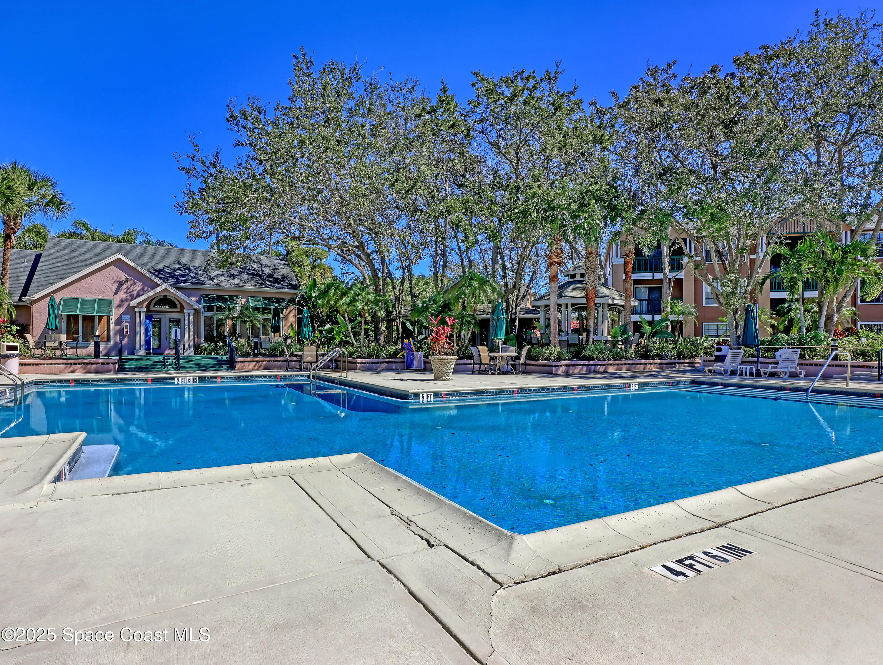 7667 North Wickham Road, Unit 1116 Melbourne, FL 32940 - Photo 31 of 34 a view of outdoor space and swimming pool