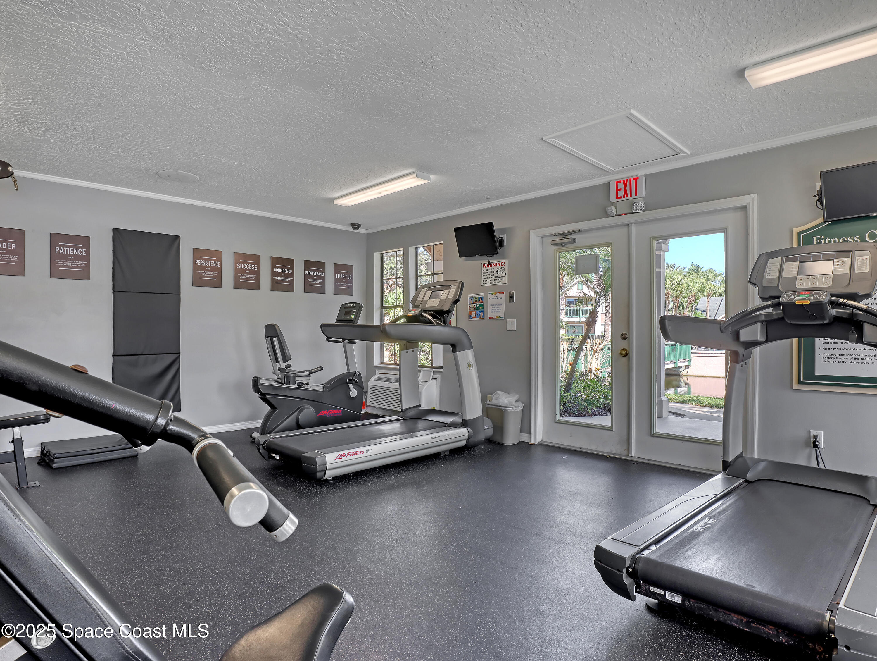 7667 North Wickham Road, Unit 1116 Melbourne, FL 32940 - Photo 34 of 34 a room with gym equipment