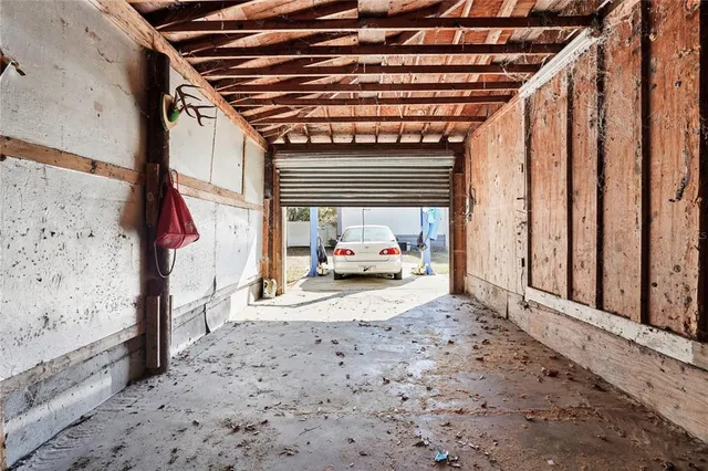 a view of a porch with wooden floor