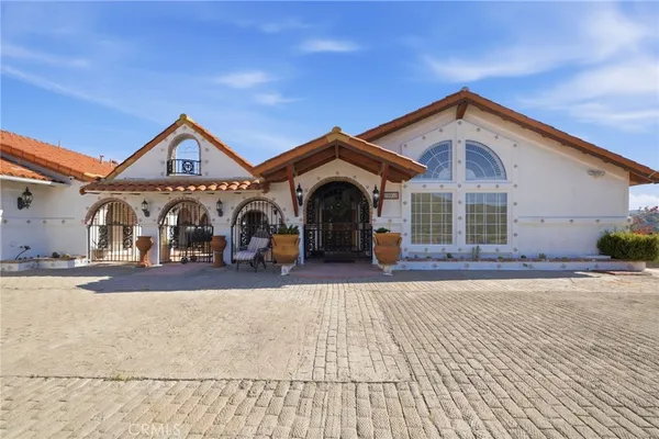 a kitchen with stainless steel appliances granite countertop a stove and a sink