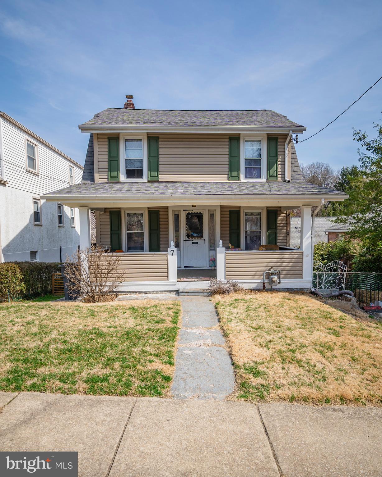 7 Chestnut Parkway Wallingford, PA 19086 - Photo 1 of 50 a front view of a house with a yard