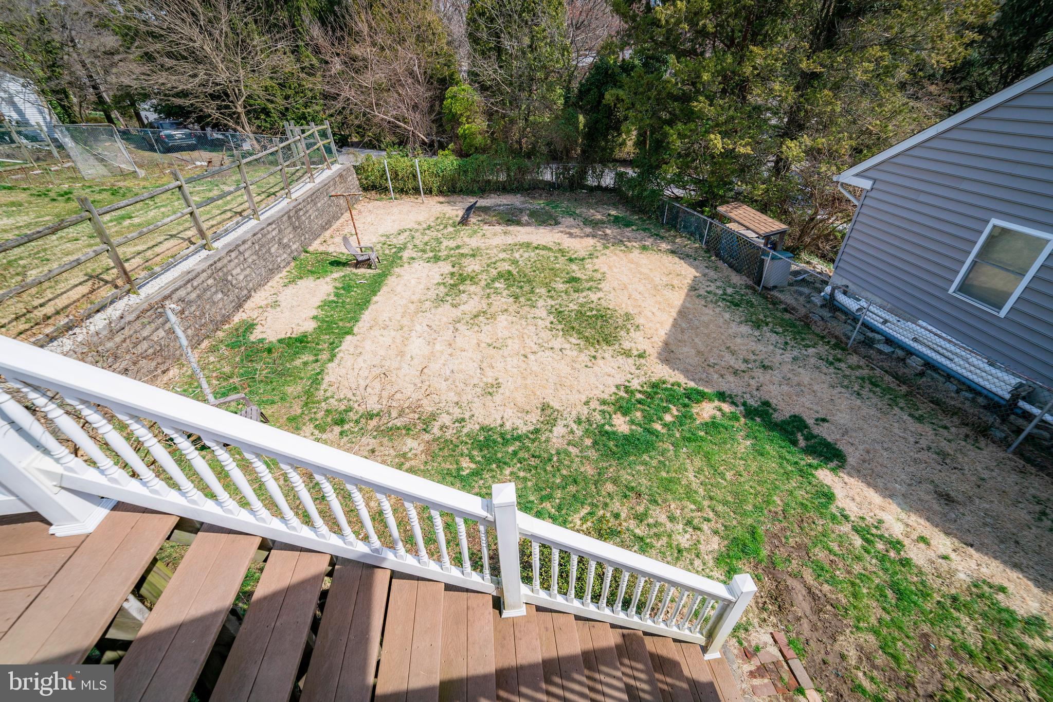 7 Chestnut Parkway Wallingford, PA 19086 - Photo 17 of 50 a view of a wooden deck with a yard