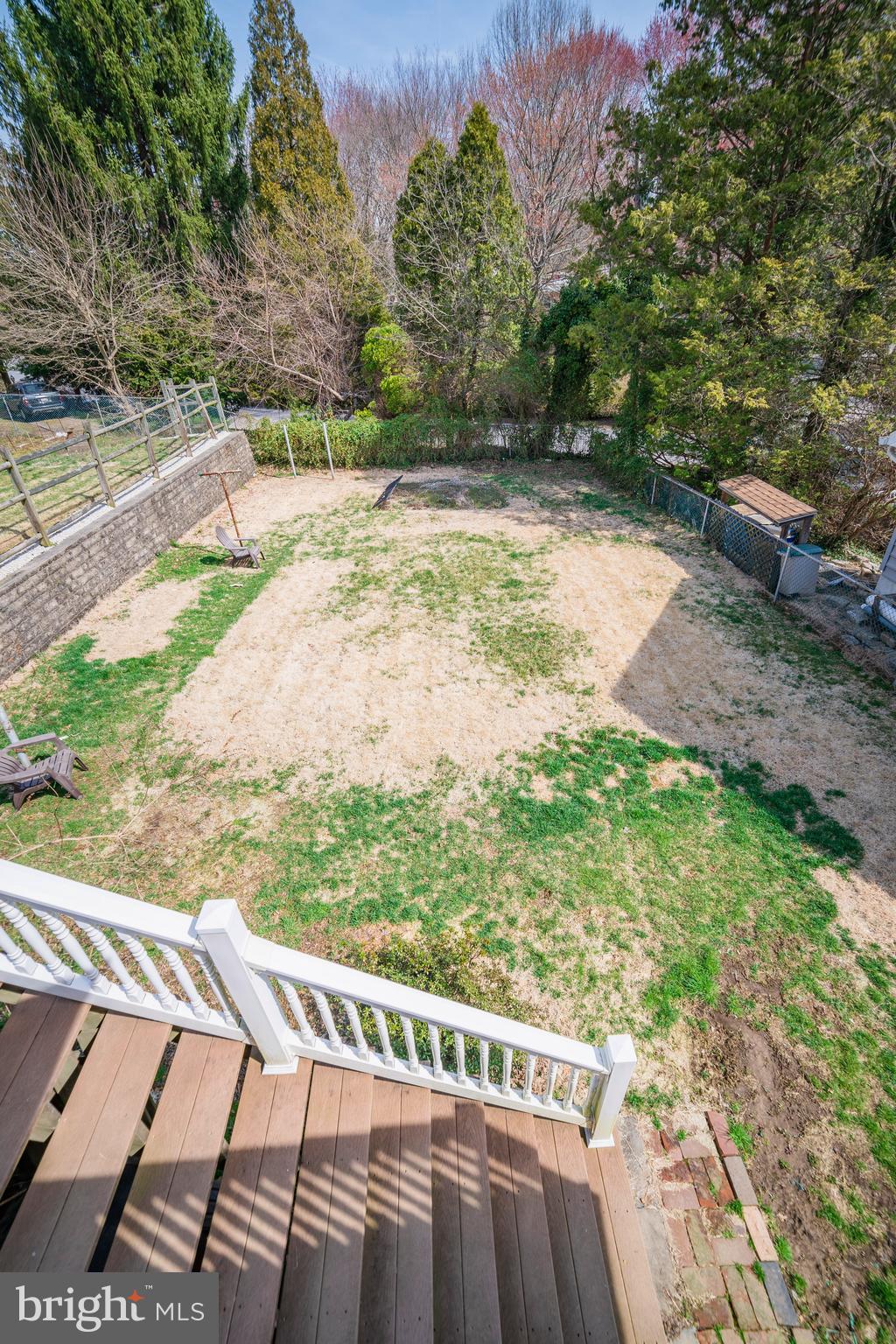 7 Chestnut Parkway Wallingford, PA 19086 - Photo 18 of 50 a view of a yard with plants and wooden fence