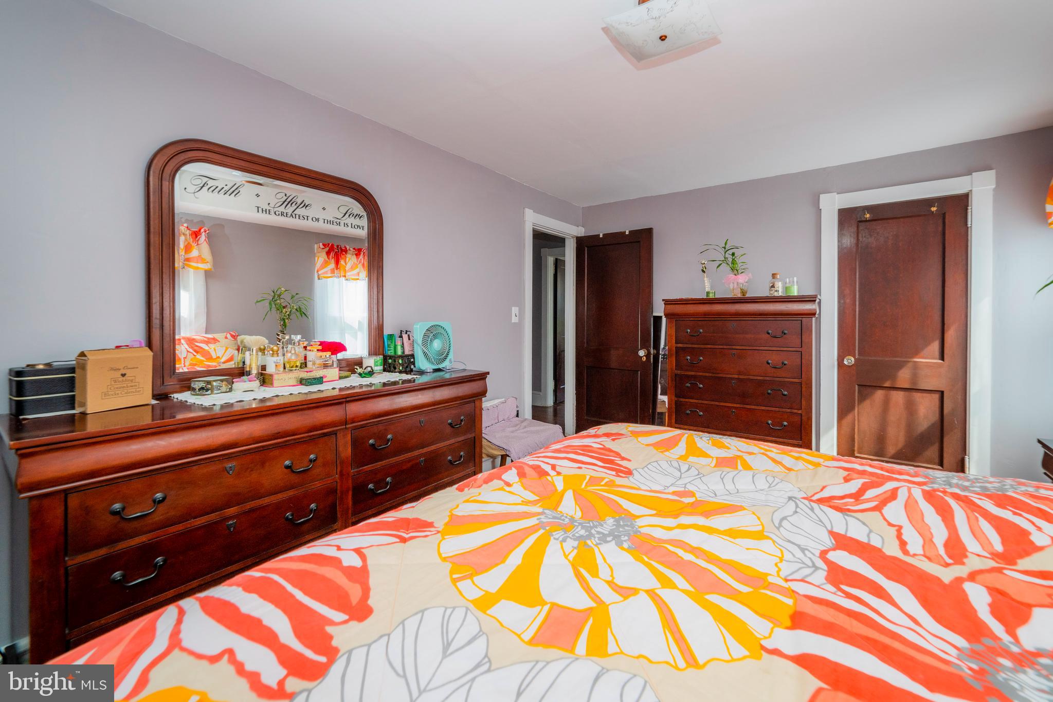 7 Chestnut Parkway Wallingford, PA 19086 - Photo 27 of 50 a bedroom with a bed and a dresser