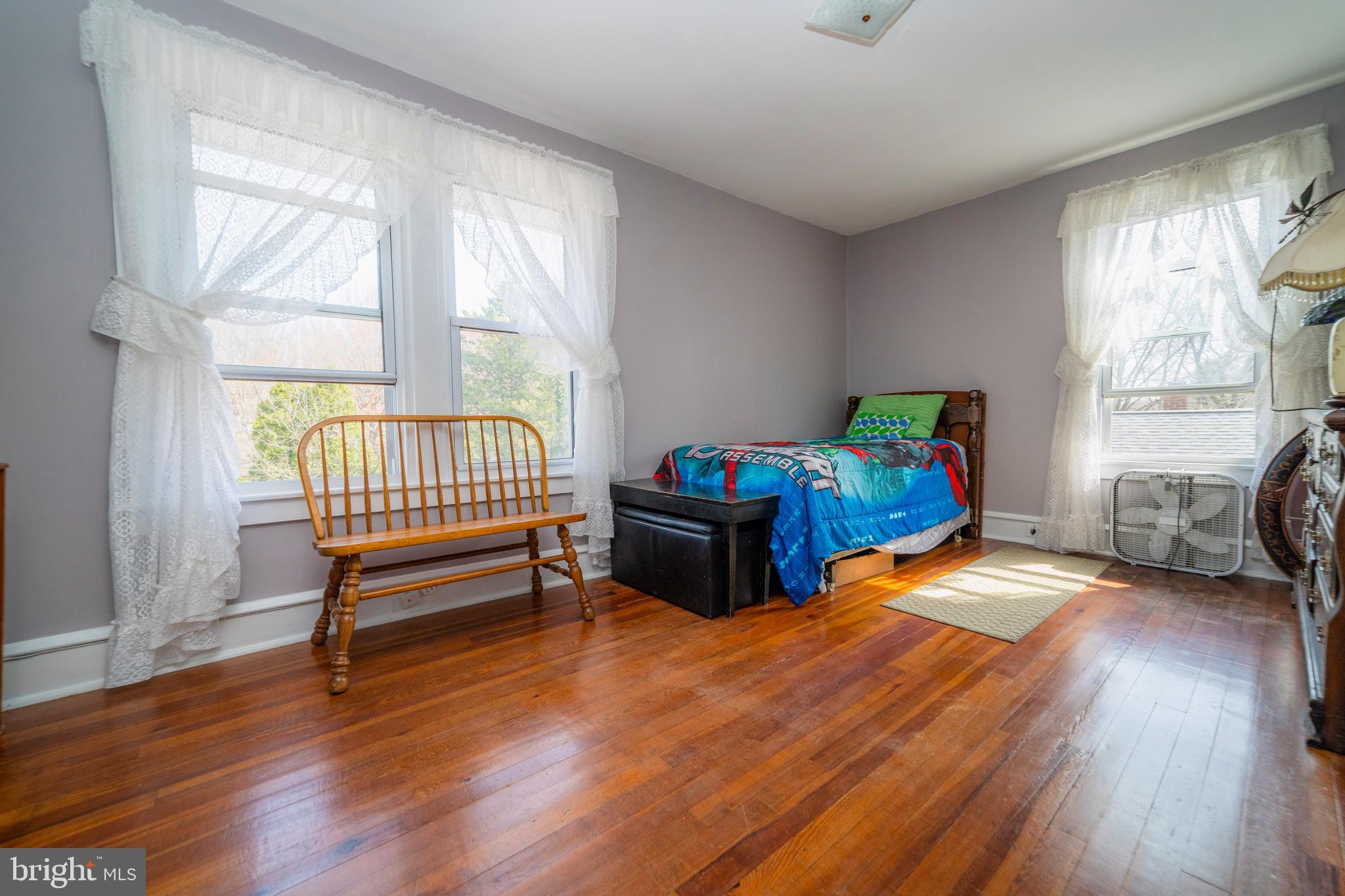 7 Chestnut Parkway Wallingford, PA 19086 - Photo 28 of 50 a bedroom with furniture and a window