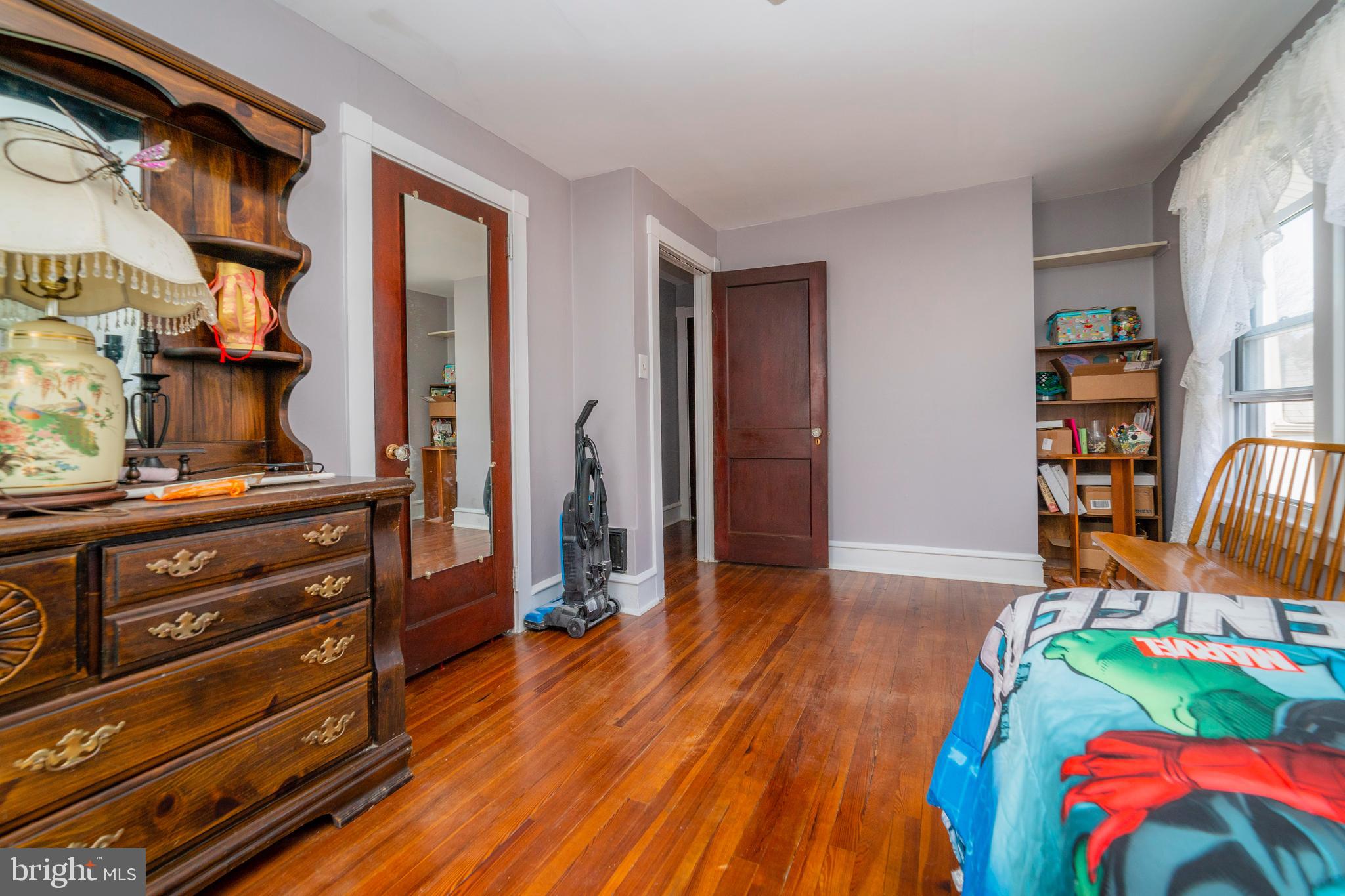7 Chestnut Parkway Wallingford, PA 19086 - Photo 29 of 50 a view of room with wooden floor and furniture
