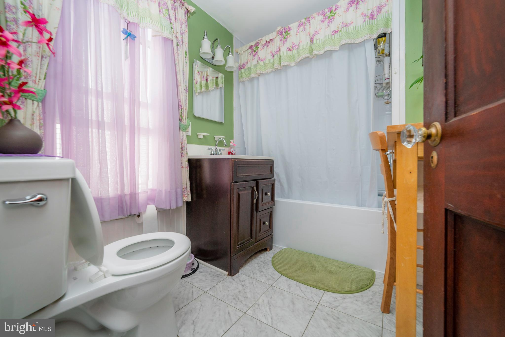 7 Chestnut Parkway Wallingford, PA 19086 - Photo 30 of 50 a bathroom with a toilet and a shower
