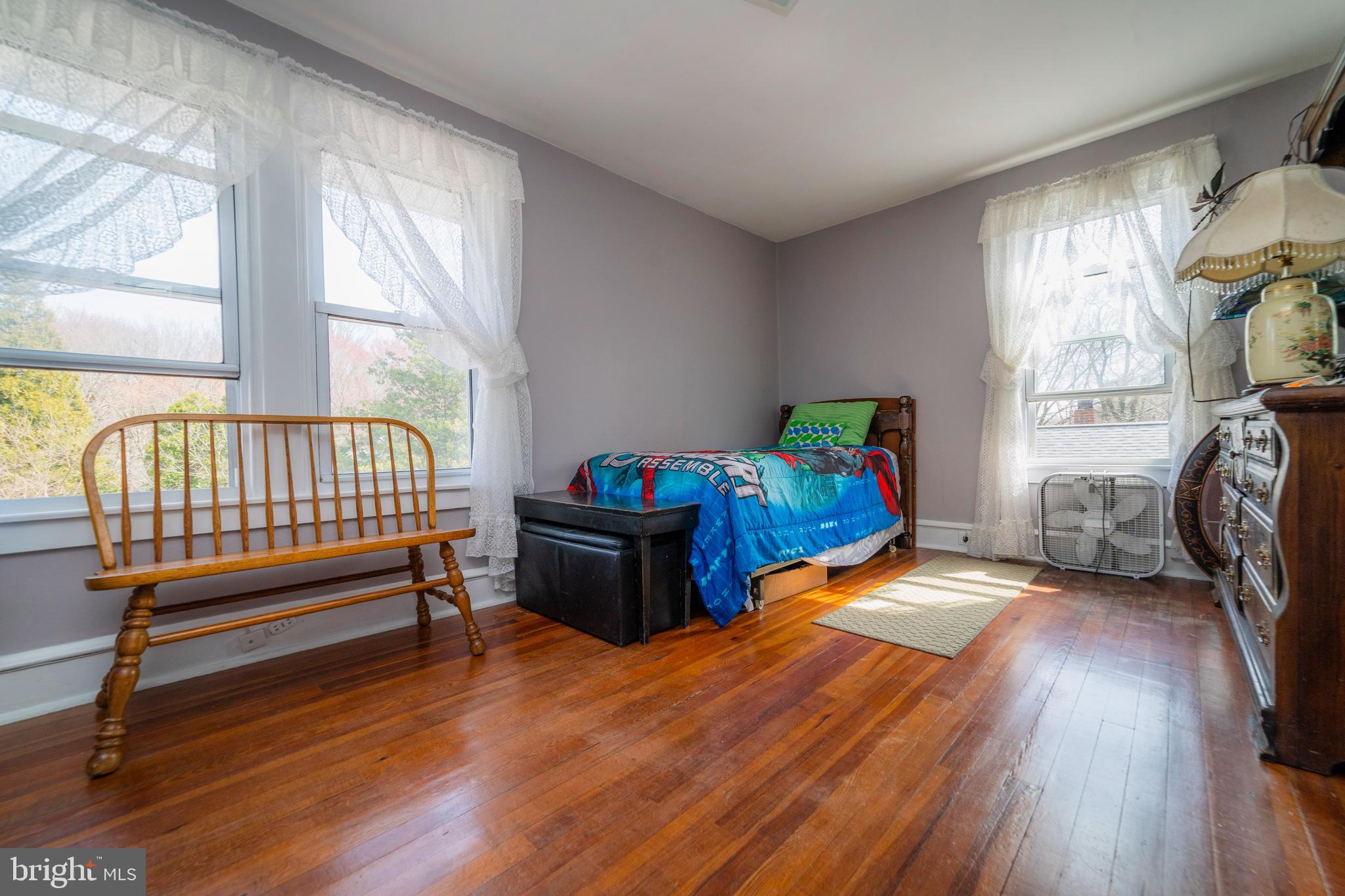 7 Chestnut Parkway Wallingford, PA 19086 - Photo 34 of 50 a bedroom with furniture and a window
