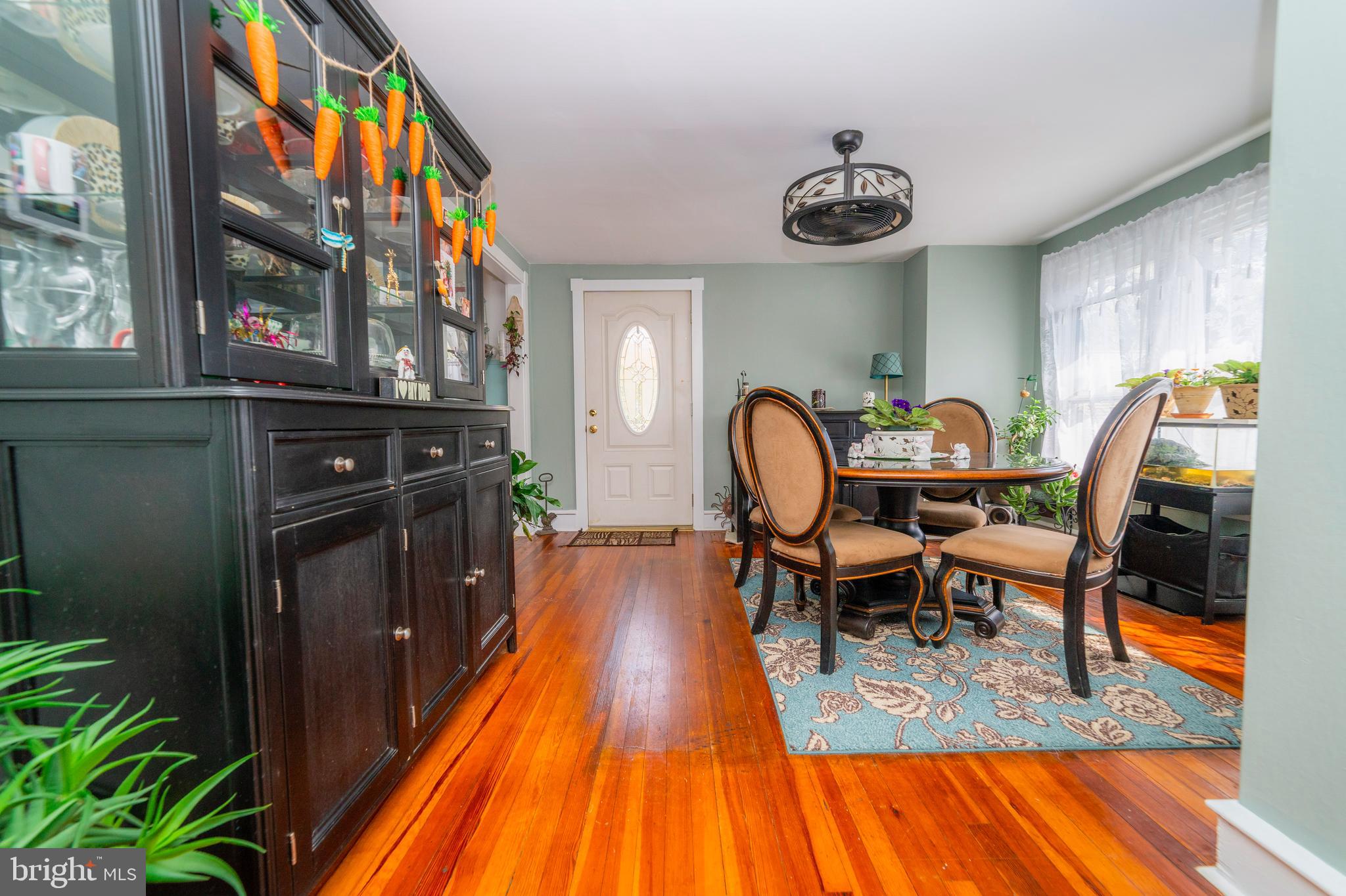 7 Chestnut Parkway Wallingford, PA 19086 - Photo 39 of 50 a view of a dining room with furniture and wooden floor