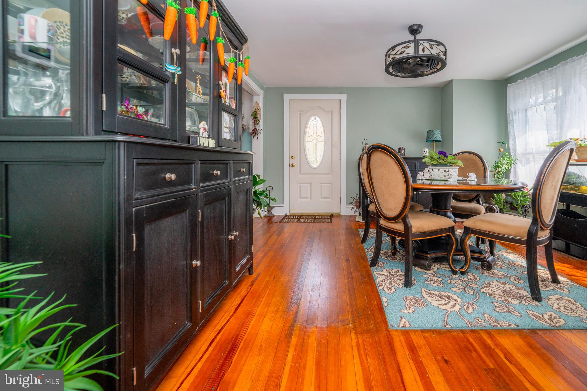 7 Chestnut Parkway Wallingford, PA 19086 - Photo 40 of 50 a view of a dining room with furniture window and wooden floor