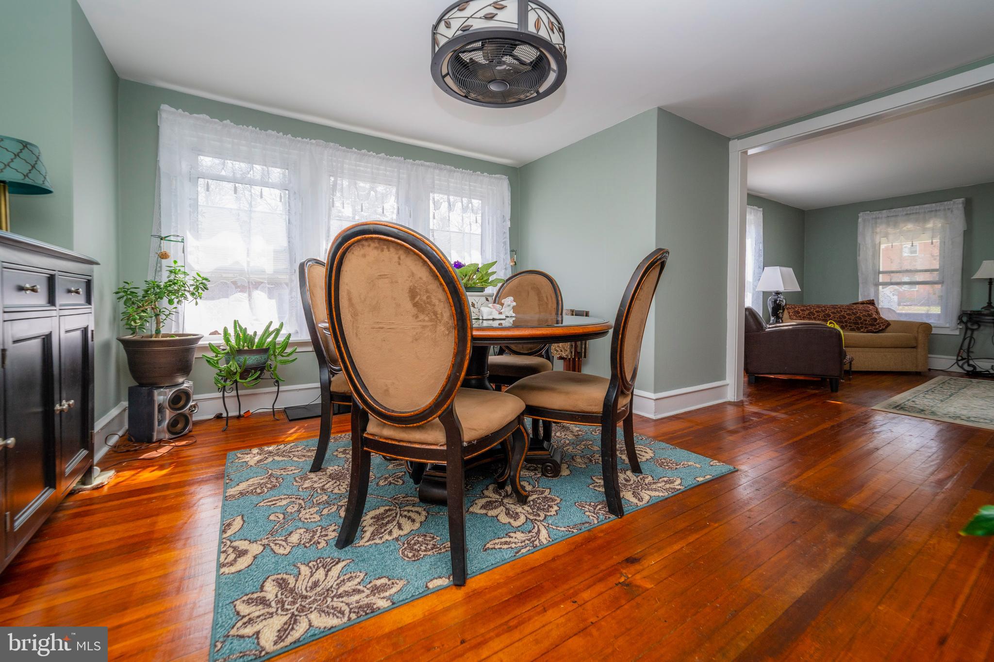 7 Chestnut Parkway Wallingford, PA 19086 - Photo 42 of 50 a living room with furniture a rug and wooden floor