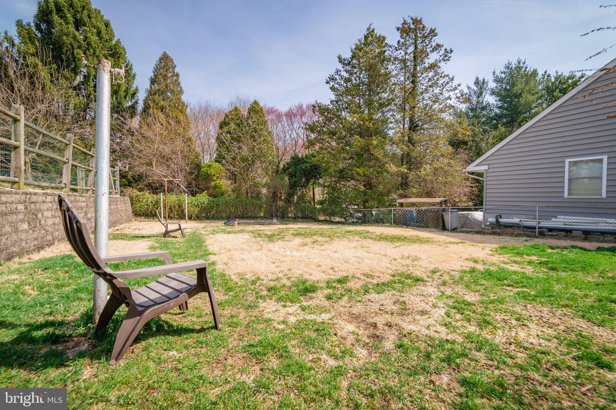 7 Chestnut Parkway Wallingford, PA 19086 - Photo 7 of 50 a view of backyard with a table and chairs