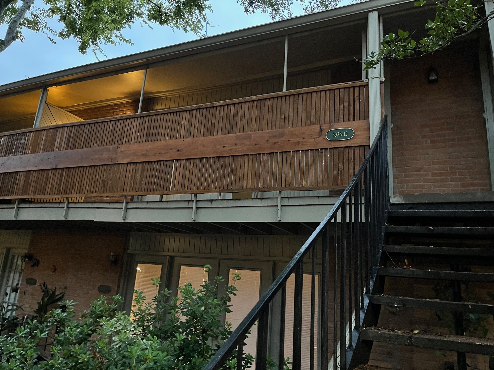 3938 West Alabama Street, Unit 12 Houston, TX 77027 - Photo 2 of 25 Front exterior of Unit #12 featuring second-floor entry & covered balcony access.