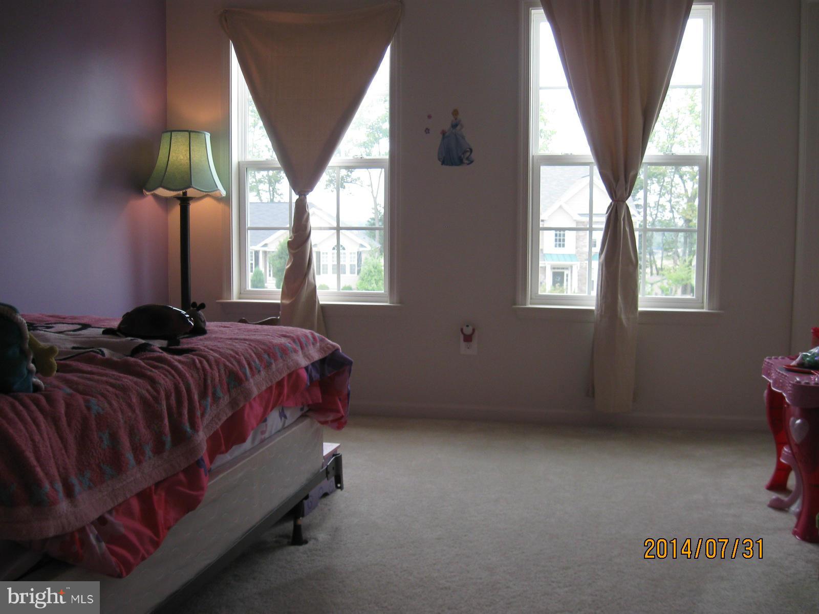 1722 Fletchers Drive Point of Rocks, MD 21777 - Photo 23 of 30 a bed sitting in a bedroom next to a window