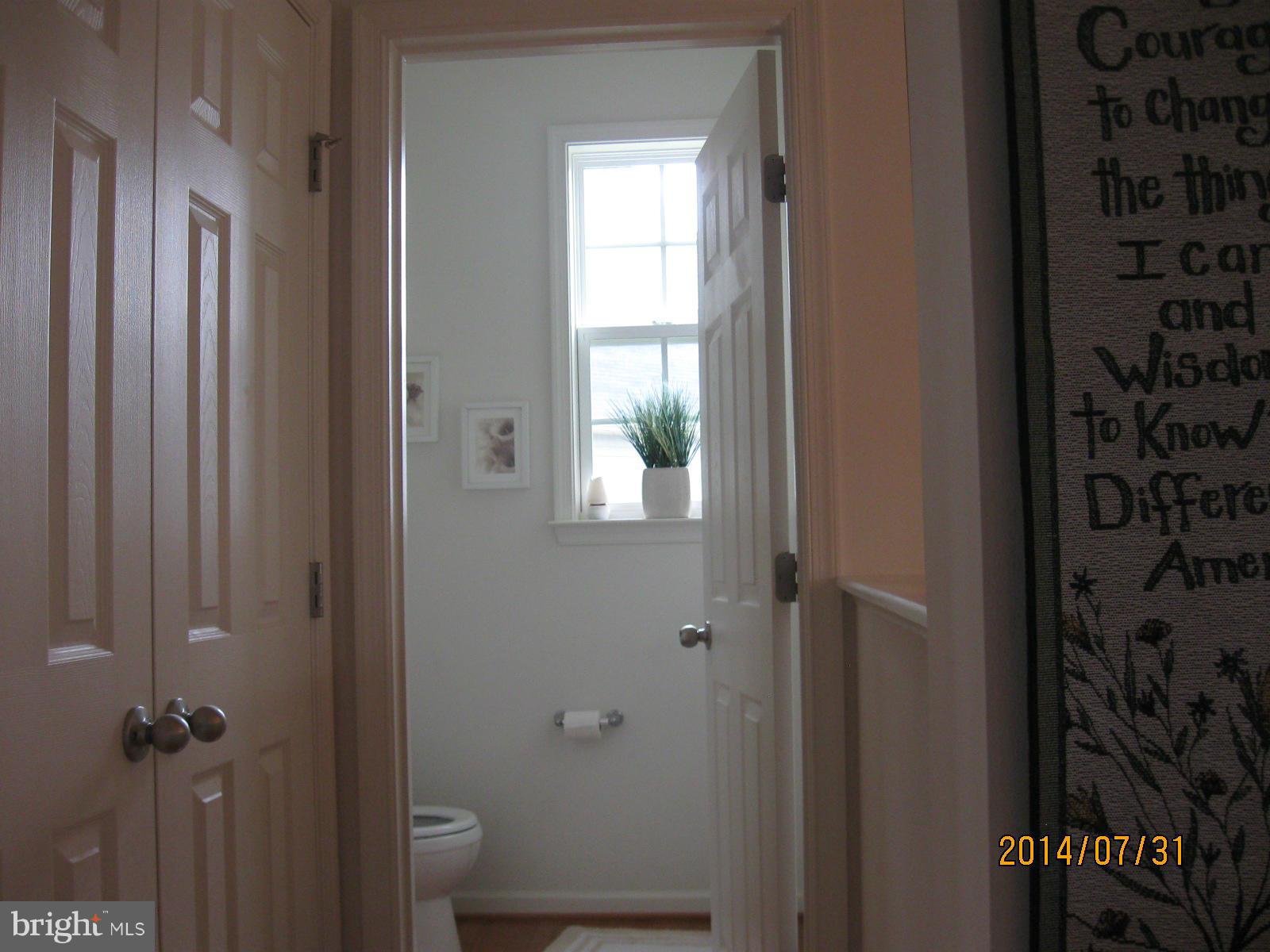 1722 Fletchers Drive Point of Rocks, MD 21777 - Photo 9 of 30 a bathroom with a bathtub