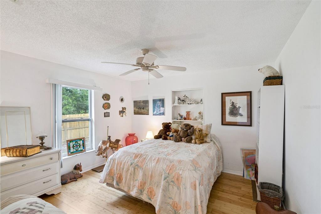 109 Hunter Point Court DeBary, FL 32713 - Photo 15 of 29 a bed room with a bed and a window