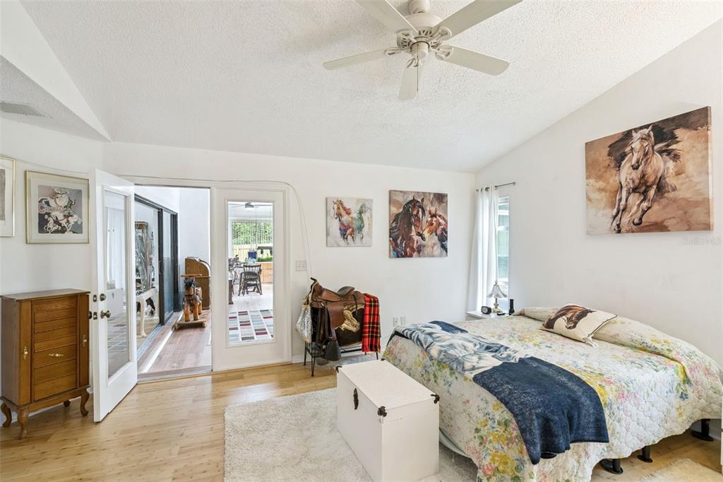 109 Hunter Point Court DeBary, FL 32713 - Photo 17 of 29 a bedroom with a bed and a couch