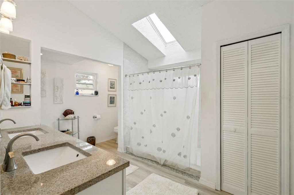 109 Hunter Point Court DeBary, FL 32713 - Photo 20 of 29 a bathroom with a sink and a mirror