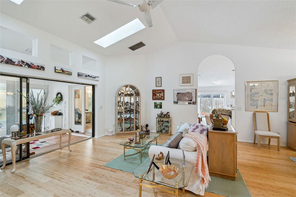 109 Hunter Point Court DeBary, FL 32713 - Photo 9 of 29 a living room with furniture and wooden floor