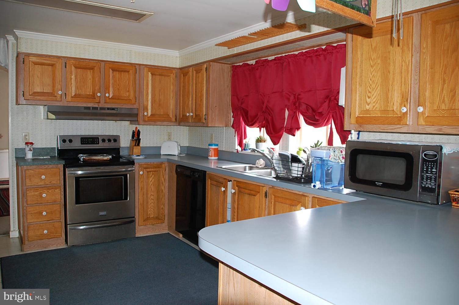 10505 Cedarville Road, Unit 91 Brandywine, MD 20613 - Photo 13 of 31 Kitchen with Breakfast Bar