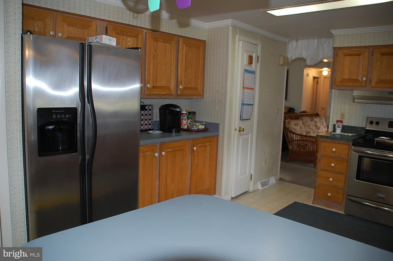 10505 Cedarville Road, Unit 91 Brandywine, MD 20613 - Photo 14 of 31 View from Breakfast Bar to Pantry