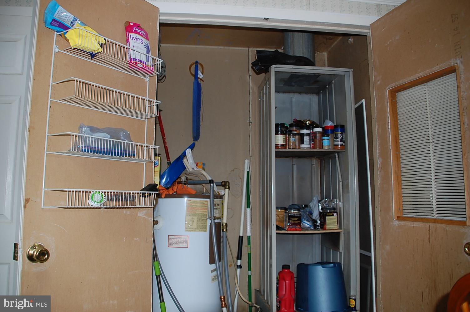 10505 Cedarville Road, Unit 91 Brandywine, MD 20613 - Photo 19 of 31 Hot Water Heater and Storage Closet