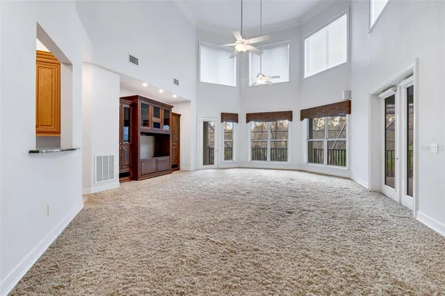 a kitchen with stainless steel appliances granite countertop a stove and a refrigerator