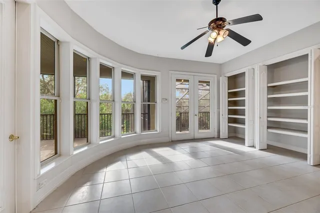 a view of entryway and hall with a front door