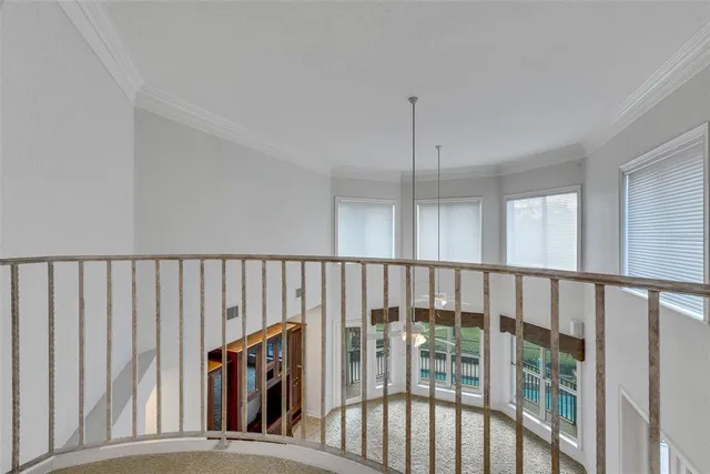 a view of a wooden deck with lake view