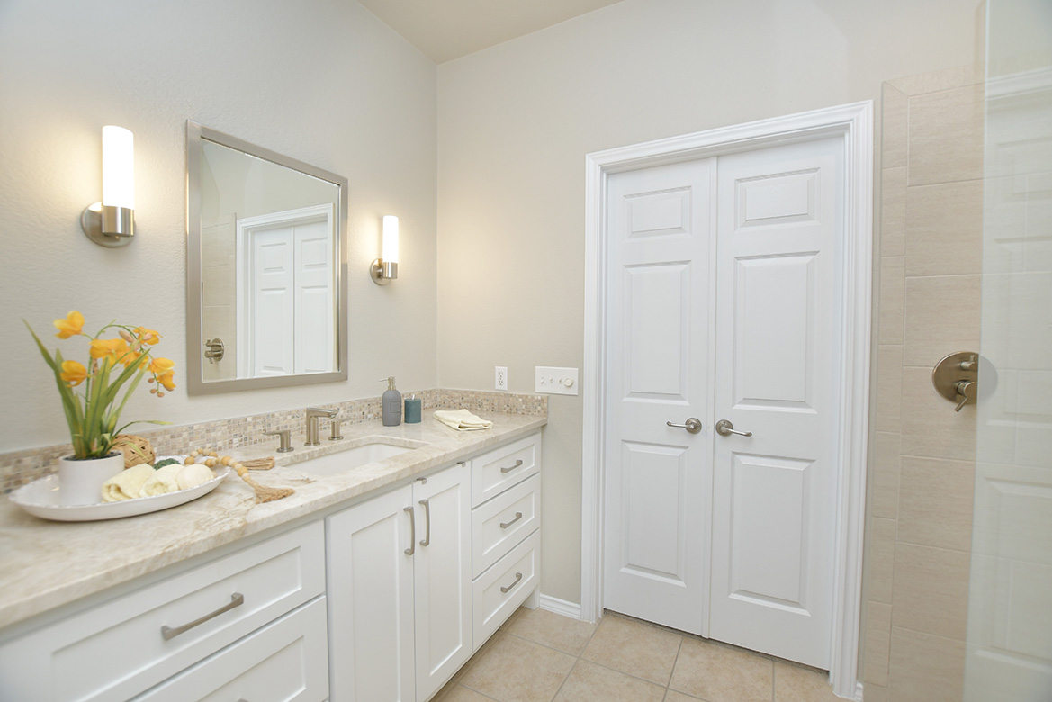 203 Winter Drive Georgetown, TX 78633 - Photo 18 of 29 Quartzite counter tops add an upscale feel to the primary bath.