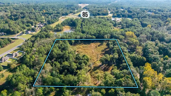 an aerial view of houses and roads