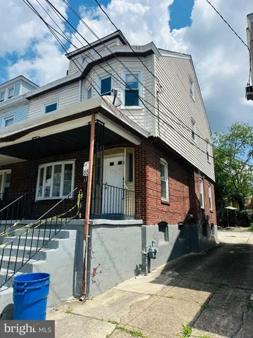 a front view of a house with garage