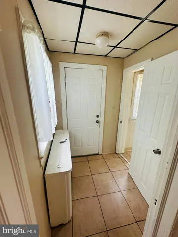 a bedroom with a bed and a table