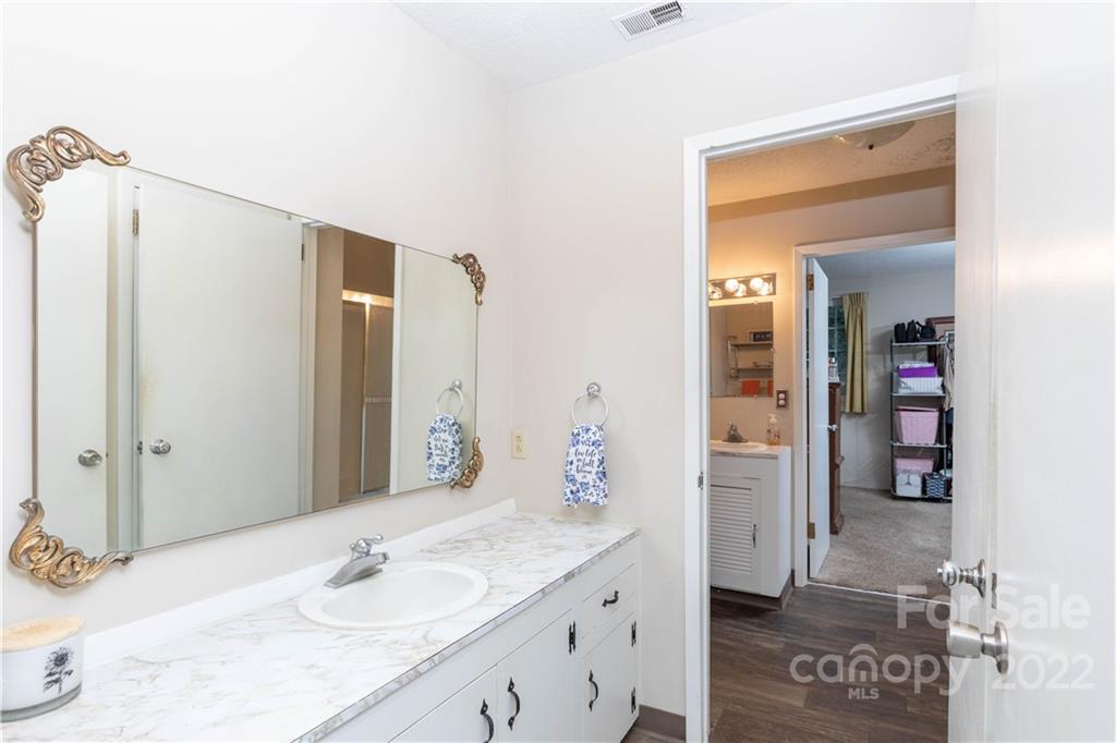 5985 Johnson Road Clover, SC 29710 - Photo 20 of 33 a bathroom with a sink and a mirror