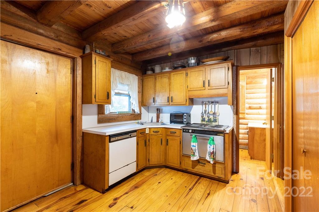 5985 Johnson Road Clover, SC 29710 - Photo 26 of 33 a kitchen with stainless steel appliances granite countertop a stove a sink and a refrigerator
