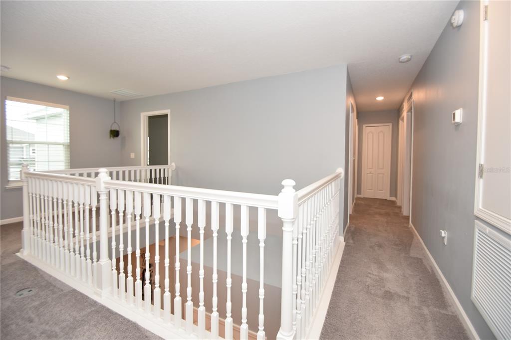 124 Oakleaf Way Palm Coast, FL 32137 - Photo 28 of 36 a view of a hallway