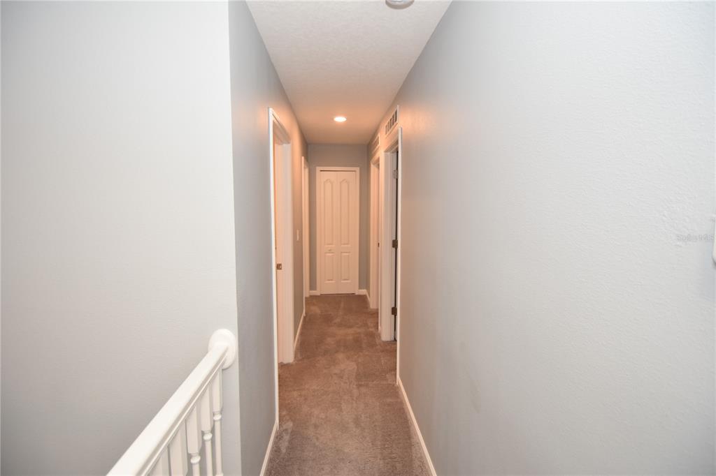 124 Oakleaf Way Palm Coast, FL 32137 - Photo 29 of 36 a view of a hallway