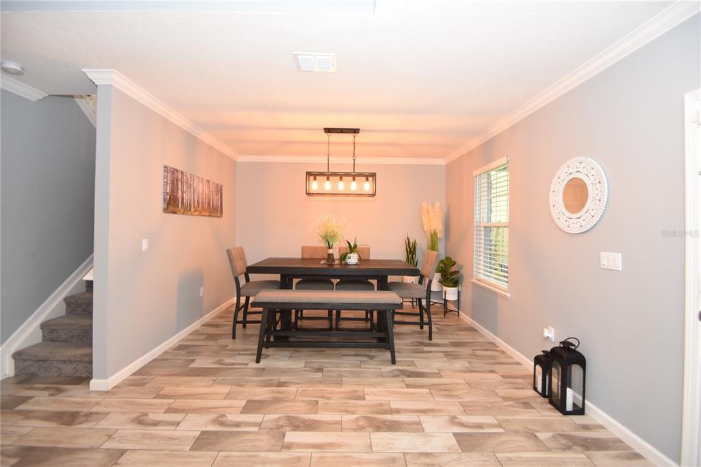 124 Oakleaf Way Palm Coast, FL 32137 - Photo 4 of 36 a view of a workspace with furniture