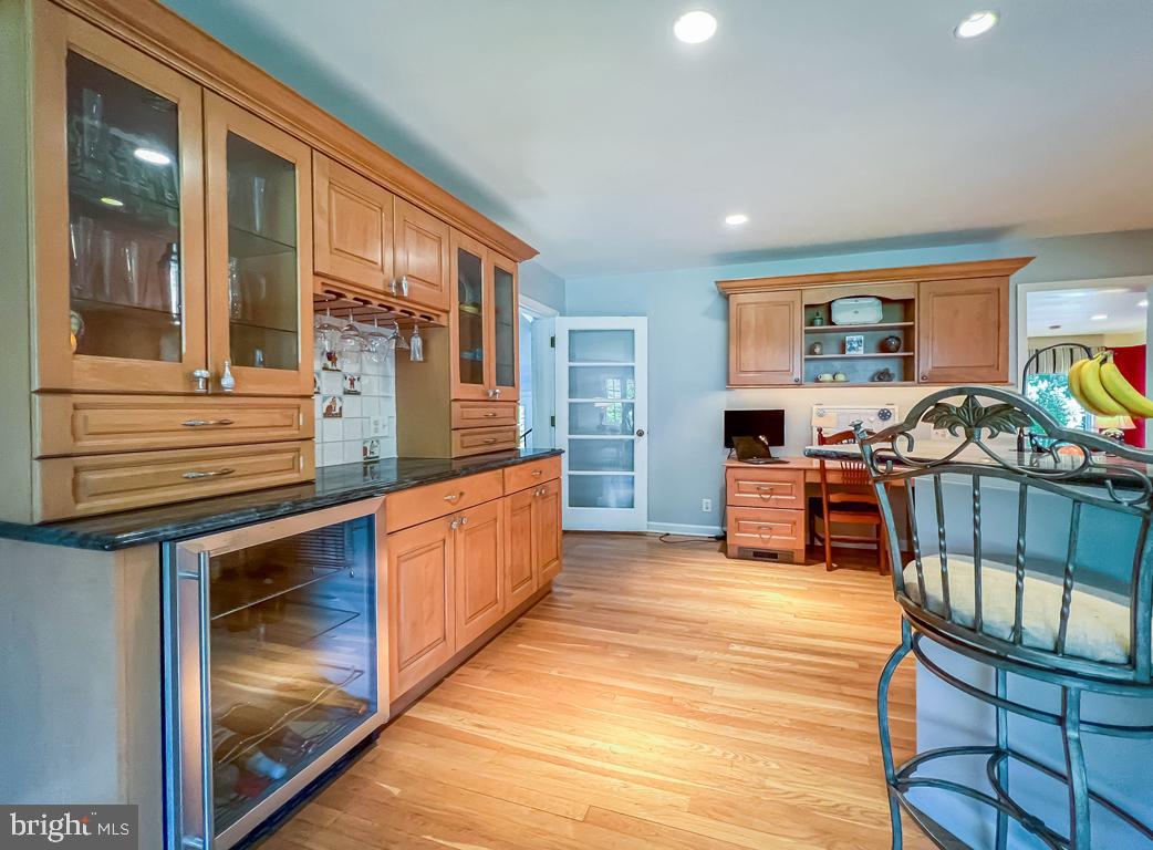 Kitchen- Built in cabinet w. wine rack.