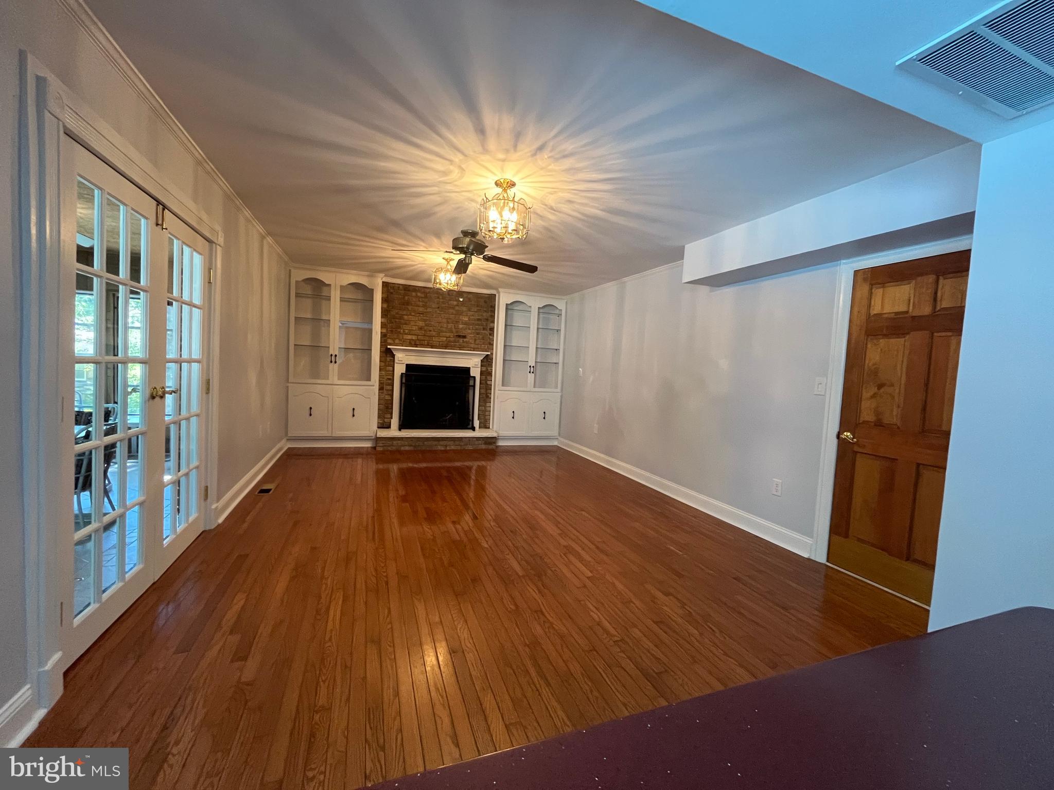 3203 Riverview Drive Triangle, VA 22172 - Photo 13 of 78 wooden floor in an empty room with a window