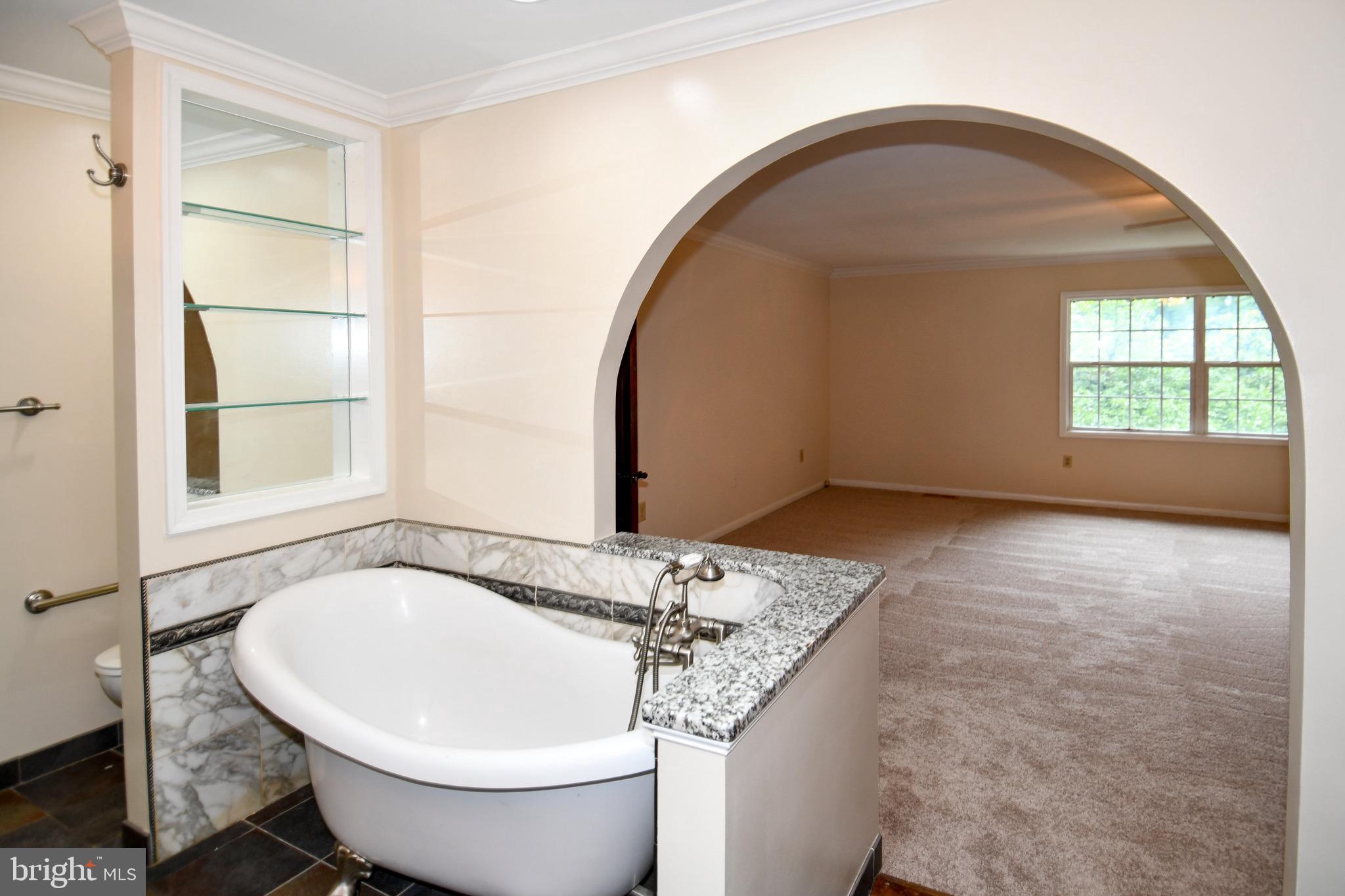 3203 Riverview Drive Triangle, VA 22172 - Photo 29 of 78 a bathroom with a granite countertop sink and a mirror