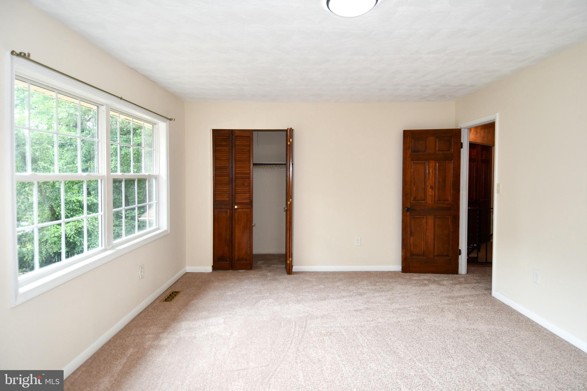 3203 Riverview Drive Triangle, VA 22172 - Photo 32 of 78 an empty room with windows and closet