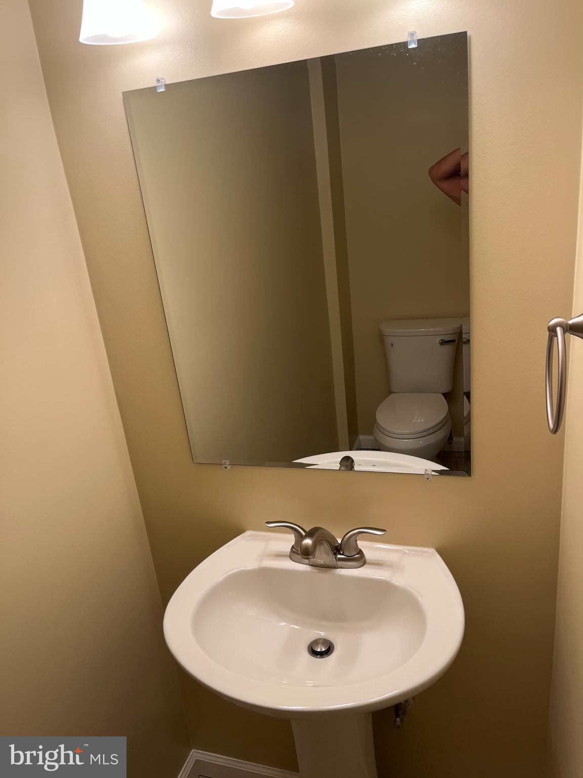 3203 Riverview Drive Triangle, VA 22172 - Photo 41 of 78 a bathroom with a sink and a mirror