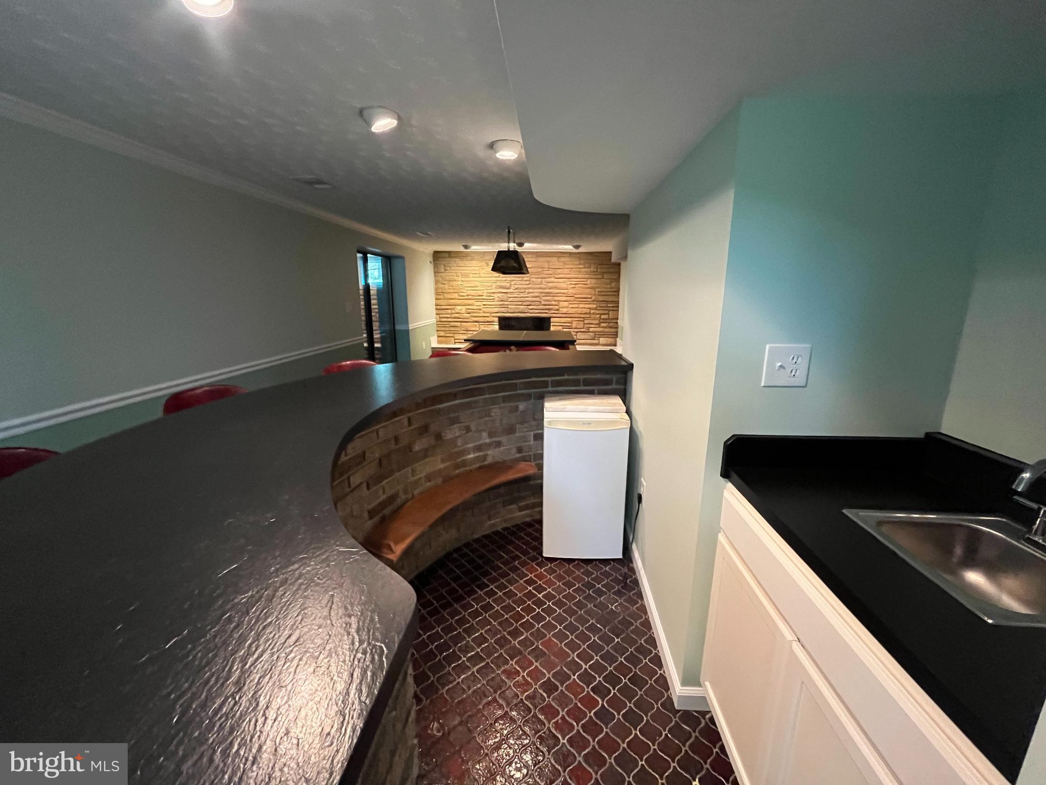 3203 Riverview Drive Triangle, VA 22172 - Photo 46 of 78 a kitchen with a sink and a stove top oven