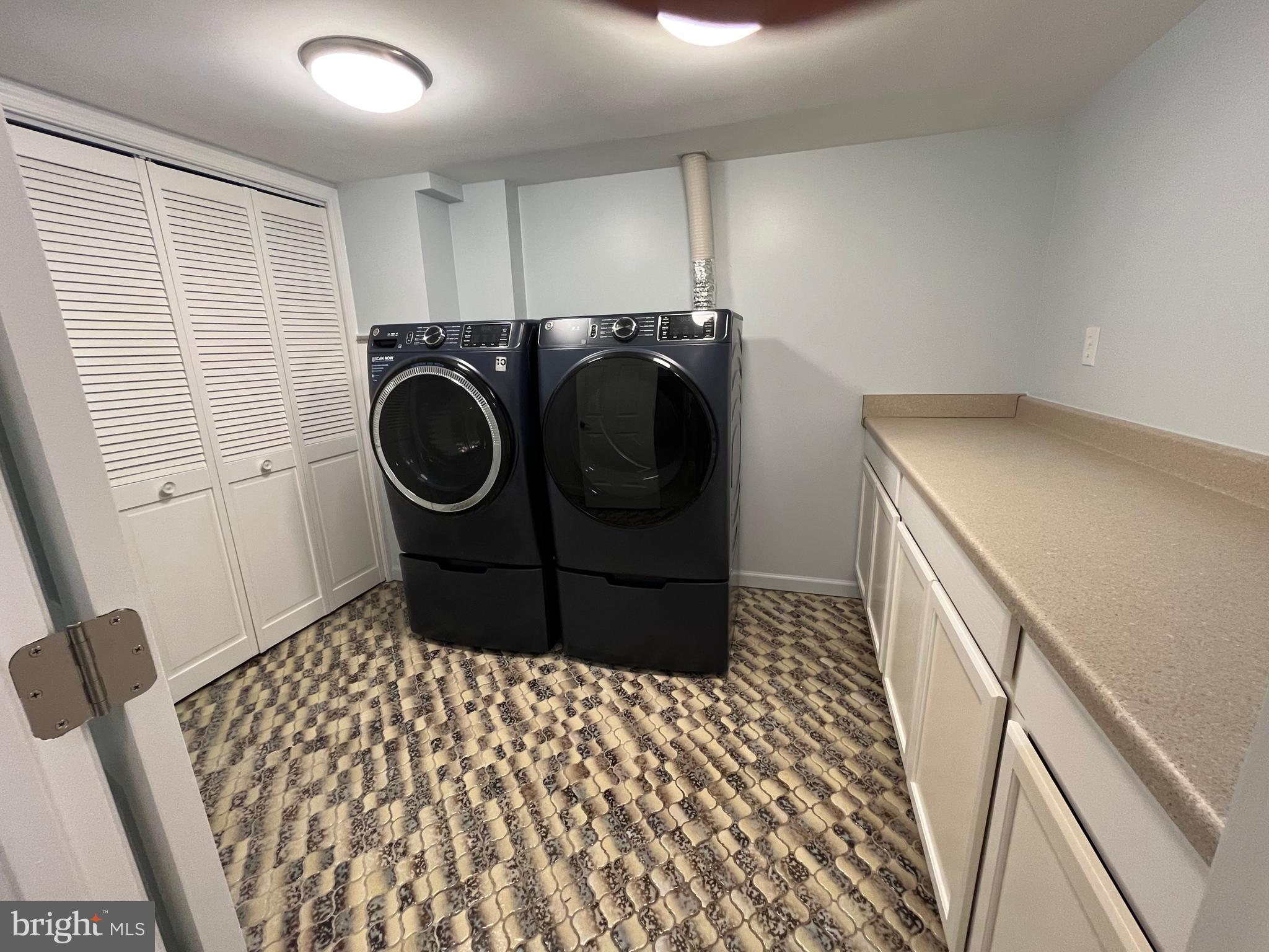 3203 Riverview Drive Triangle, VA 22172 - Photo 53 of 78 a utility room with dryer and washer