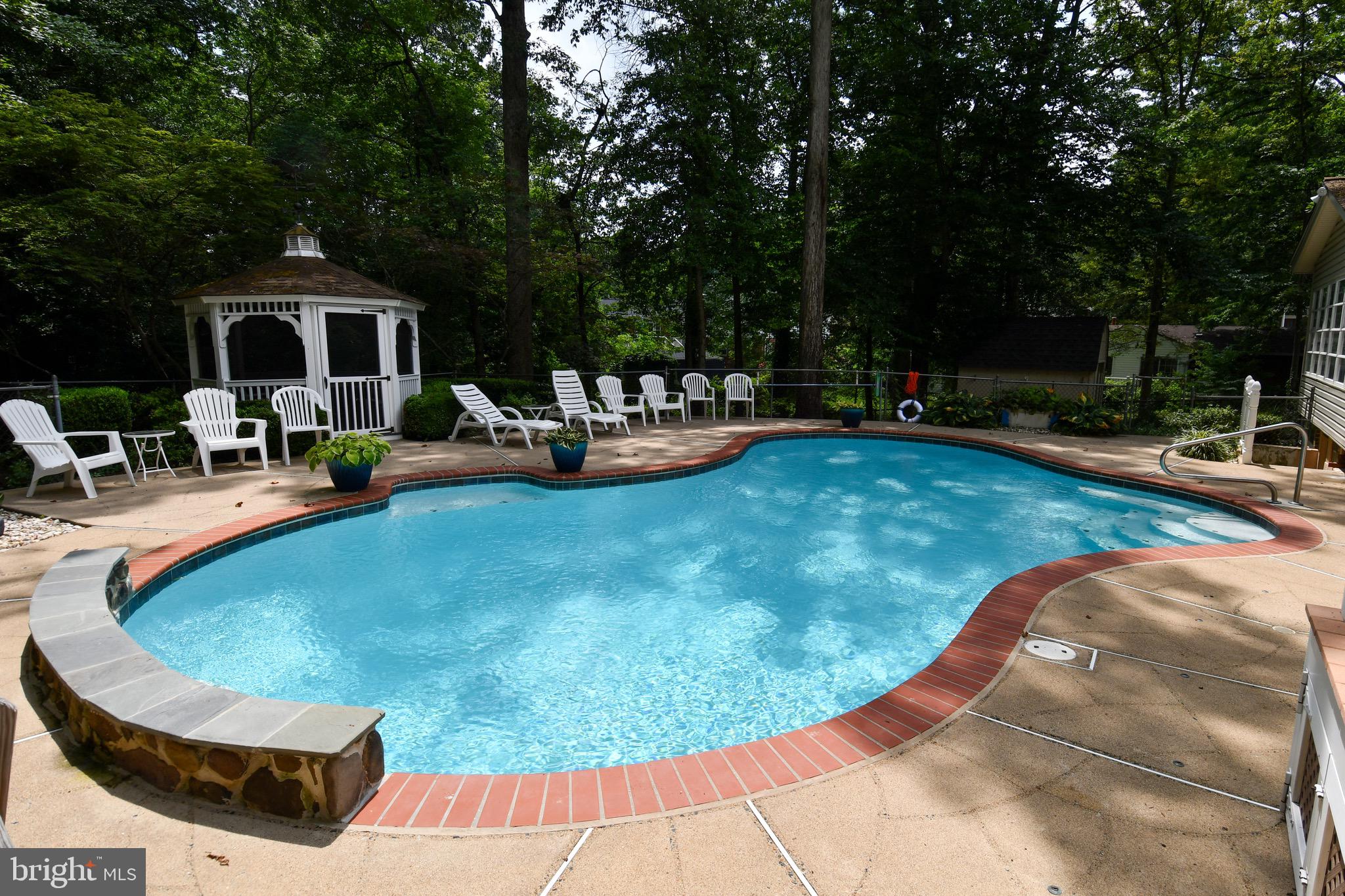 3203 Riverview Drive Triangle, VA 22172 - Photo 69 of 78 a view of a swimming pool with lounge chair