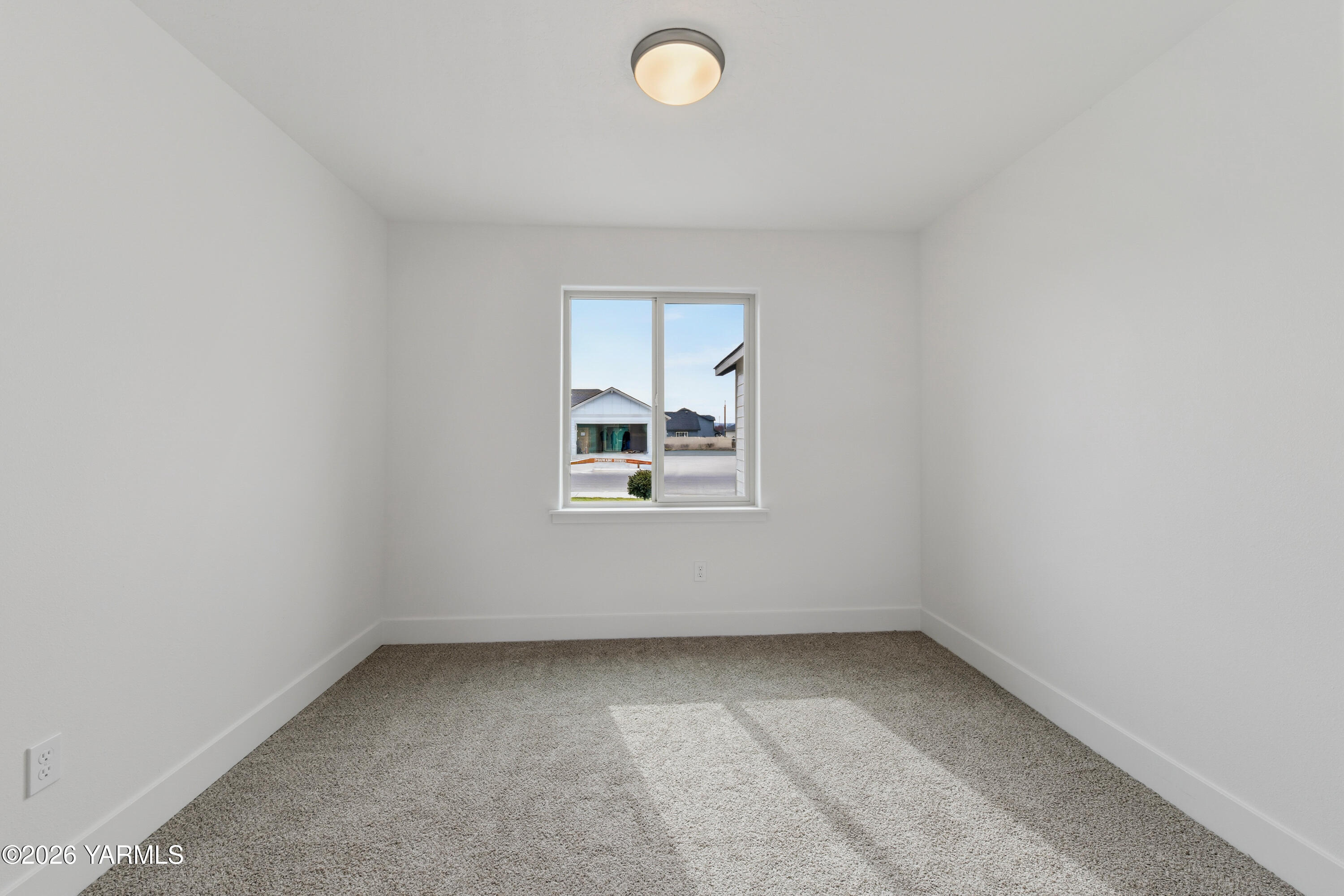 606 Grapevine Street, Unit PHASE 3 LOT 8) SPEC Grandview, WA 98930 - Photo 5 of 28 a view of room and window