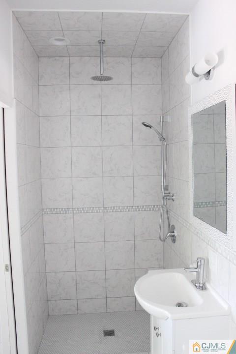 15 Sturgis Road Edison, NJ 08817 - Photo 14 of 50 a bathroom with a shower and a sink