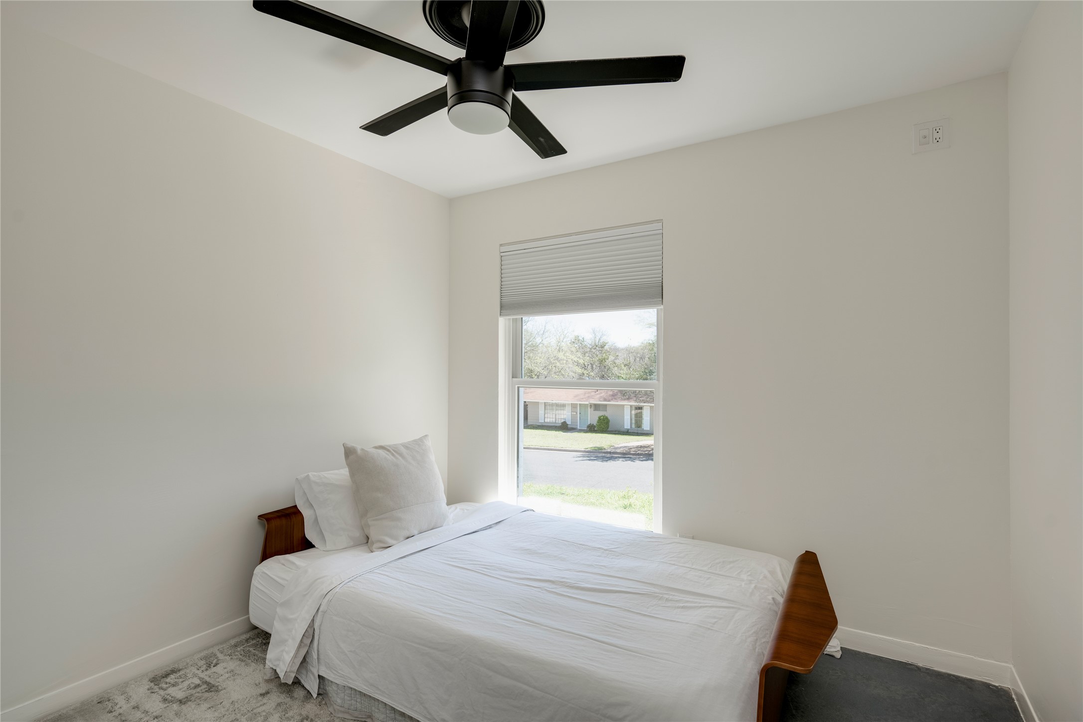 3606 Wilson Street Austin, TX 78704 - Photo 13 of 34 Bedroom featuring ceiling fan and carpet flooring